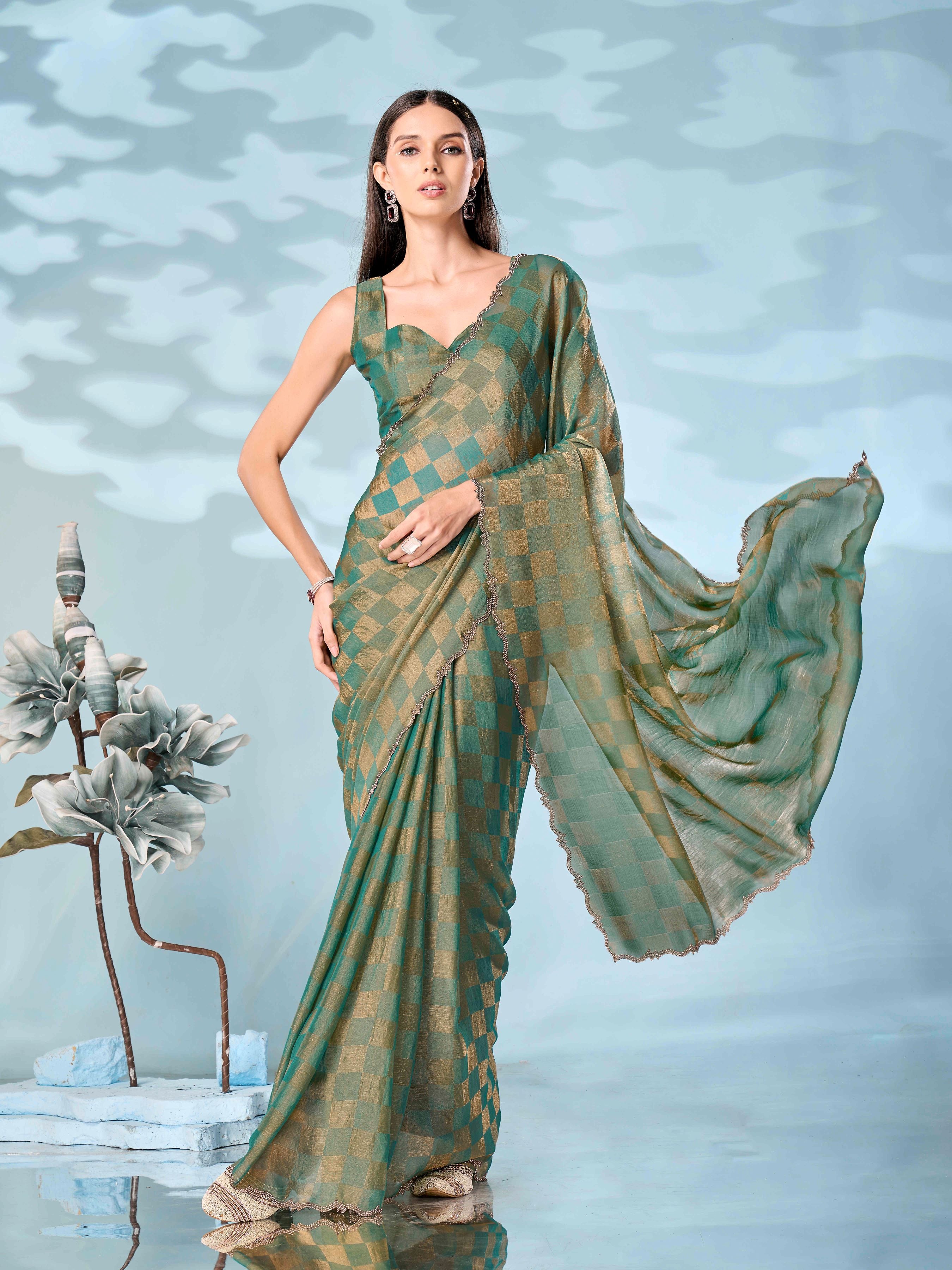 Checks pattern two tone green & golden colored designer saree with swaroski border